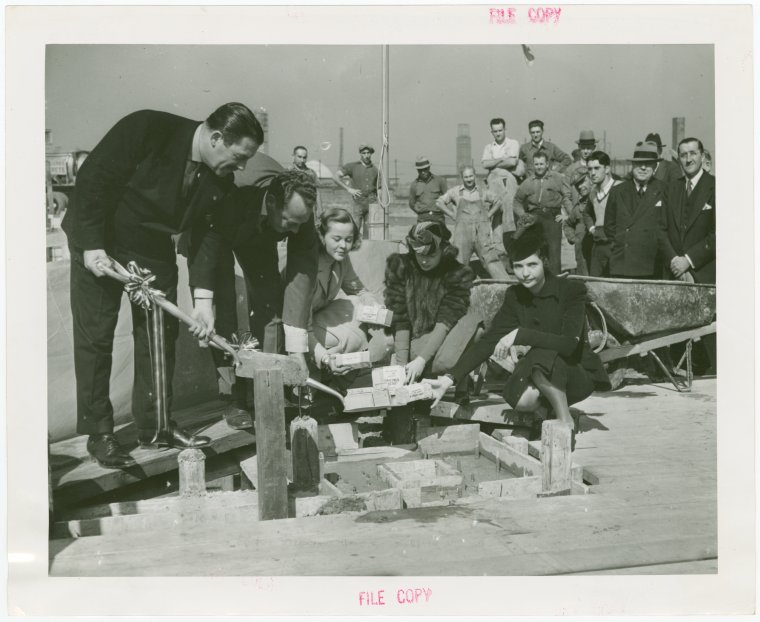 Ballantine - Grover Whalen and Carl W. Badenhausen with girls putting money in cornerstone, Digital ID 1665007, New York Public Library