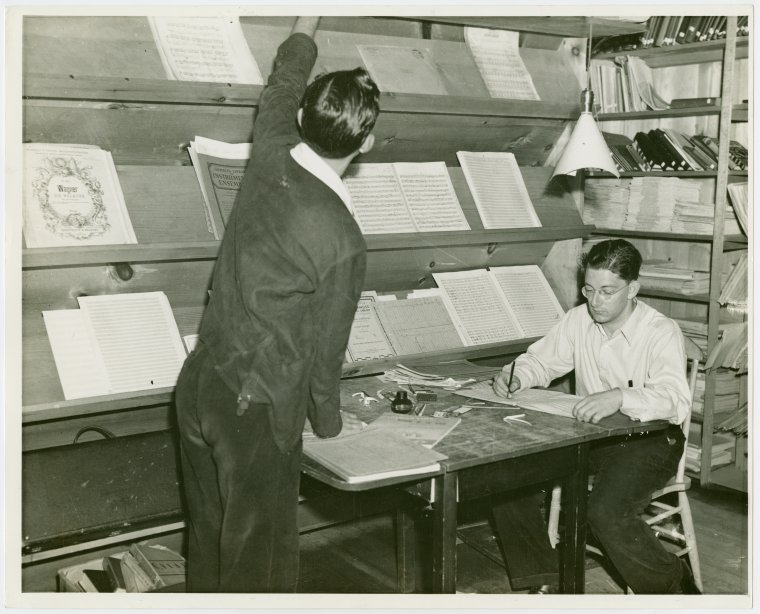 National Music Camp - Student and librarian in music score library, Digital ID 1678327, New York Public Library