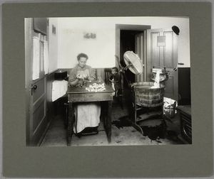 This mother, at work in the ki... Digital ID: 464431. New York Public Library