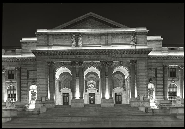  Fifth Avenue facade at night, portico and part of rest of the facade, lit up, July 4, 1914., Digital ID 465464, New York Public Library