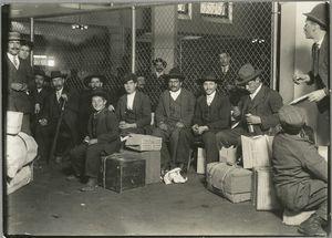 Group waiting at Ellis Island Digital ID: 79881. New York Public Library
