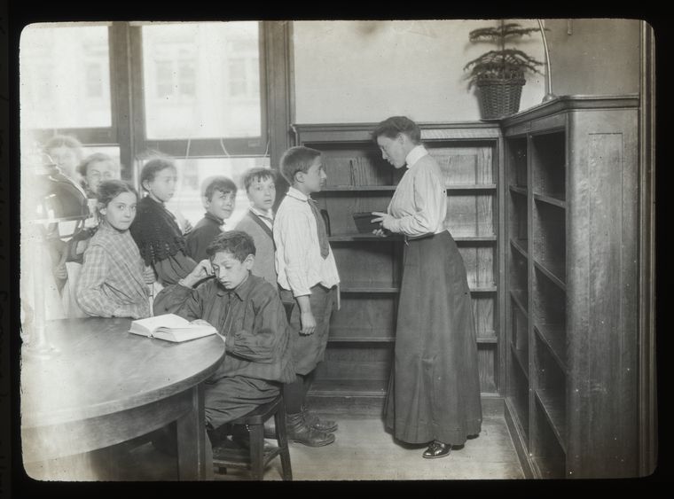 Seward Park Branch, companion picture to 'Choosing an American History,' April 11, 1910., Digital ID 94629, New York Public Library