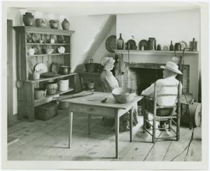 [Woman and man sit in Walt Whi... Digital ID: 1636029. New York Public Library