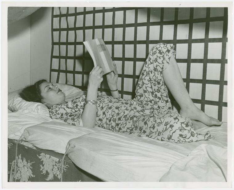 Amusements - Games and Rides - De-Bunk-Her - Girl reading in bed
