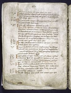 Page of text with quire signature visible.
