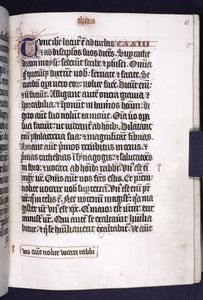 Page of text with small initial, chapter number, and correction in right and
lower margin.