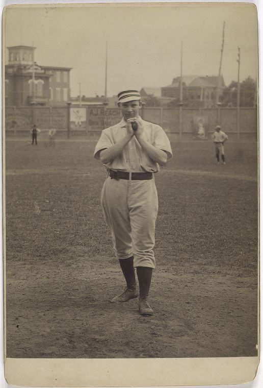 [Unidentified baseball player in pitching form.]
