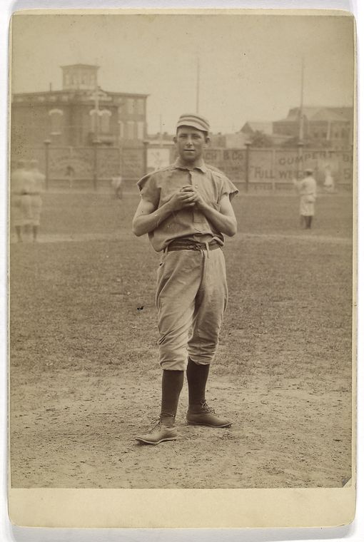 [Unidentified baseball player in pitching form.]