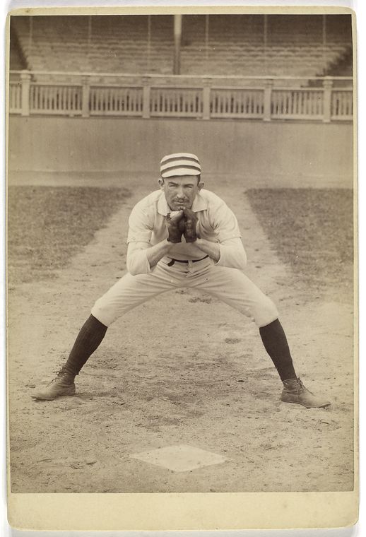 [Unidentified baseball player in catching form.]