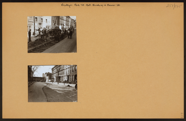 Park Street between Broadway and Beaver Street showing W.P.A. men working on a highway project. View one shows the north side of the street looking east; view two looks westward and shows the "El" on Broadway (1935) Credit: New York Public Library