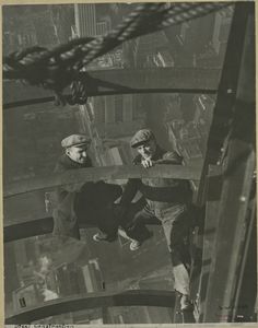 Two workers inspecting steel Digital ID: 79860. New York Public Library