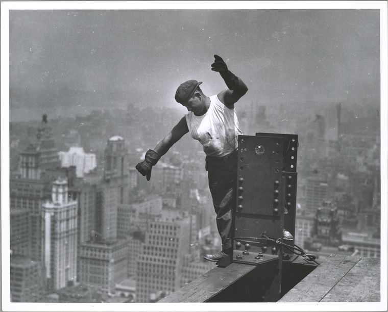 Worker on Empire State building, signaling the hookman