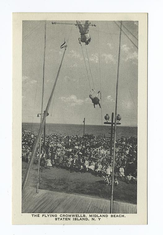 The Flying Cromwells, Midland Beach, Staten Island, N.Y.  [close up of trapeze performers on boardwalk, audience in background.], Digital ID 104496, New York Public Library