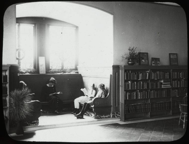 People reading in the window seats, Main Children's room, 1914., Digital ID 115812, New York Public Library