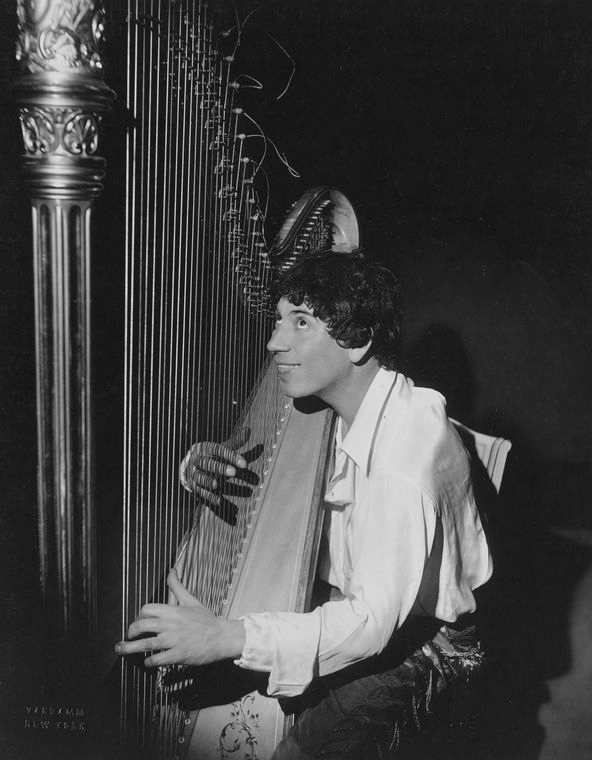 Harpo Marx [playing the harp], NYPL Digital ID 1158253 