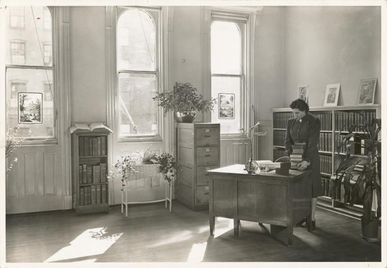 [Ottendorfer, Librarian standing at desk], Digital ID 1253010, New York Public Library