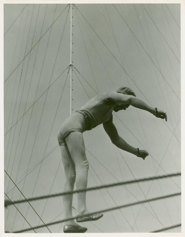 Amusements - Shows and Attractions - Aerial Acts and Airshows - Acrobat on tightrope, Digital ID 1653480, New York Public Library