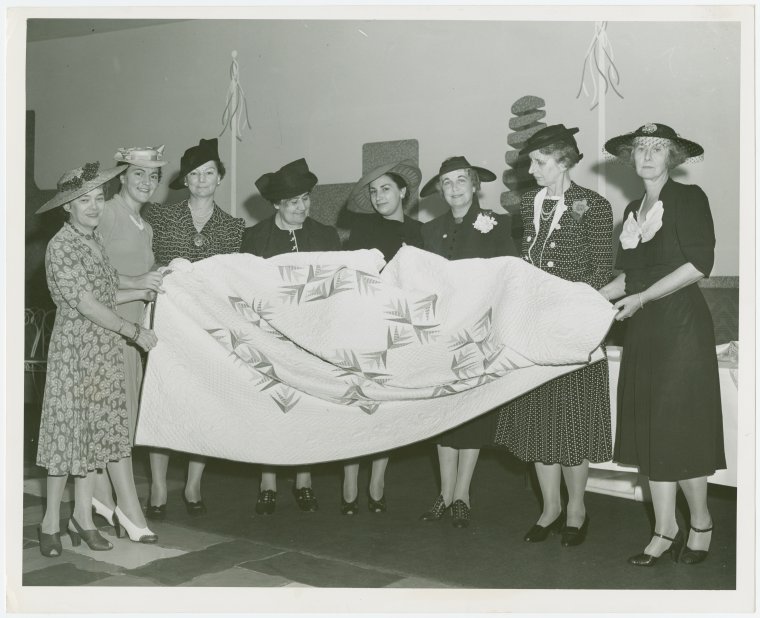 Contests - America through the Needle's Eye - Judges with prizewinning quilt, Digital ID 1668061, New York Public Library
