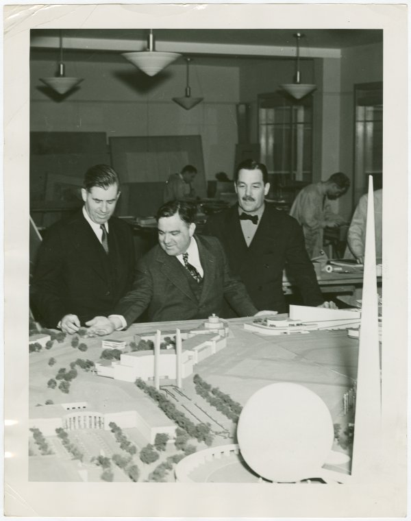 LaGuardia, Fiorello, H. - Whalen, Grover - Looking at architectural model, Digital ID 1676963, New York Public Library