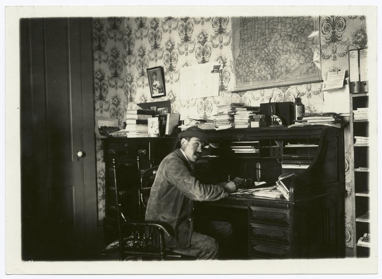 [Man writing at a desk], Digital ID 93949, New York Public Library