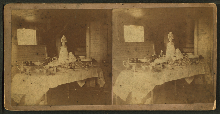 Table set with a wedding cake and fruits, Victor, Iowa., Digital ID G90F190_030F, New York Public Library