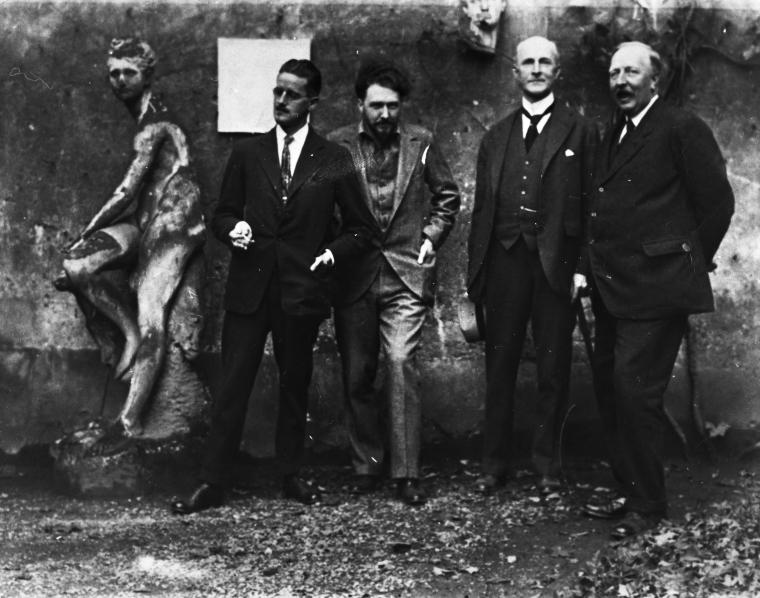 James Joyce, Ezra Pound, John Quinn and Ford Madox Ford in Paris, Autumn 1923, outside Pound's studio in the Rue des Champs., Digital ID ps_mss_cd21_313, New York Public Library