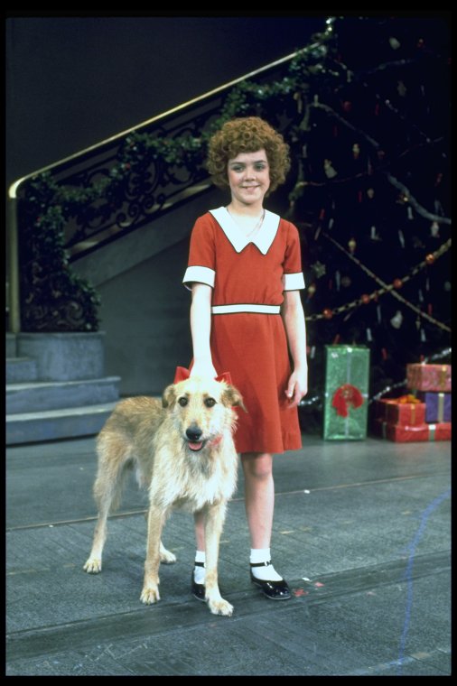 Actress Andrea McArdle as Annie w. Sandy in a scene from the Broadway production of the musical "Annie." (1977) 