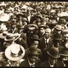 Photographer in a crowd, ca 1910