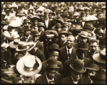 Photographer in a crowd, ca 1910