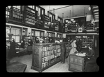 Aguilar F. C. L., people choosing books, librarian at desk, left