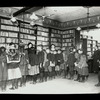 Aguilar F. C. L., 624 #. 5th St., Children in line at application desk