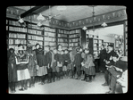 Aguilar F. C. L., E. 5th St. Branch, about 1896, children in line at application desk