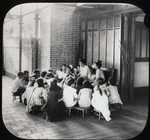 Hamilton Fish, children gathered around librarian, roof story hour