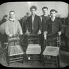 Hamilton Fish, men with chairs they are caning