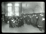 Harlem Library, children's room, showing children choosing books and sitting at tables