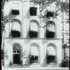 Harlem, exterior view showing awnings down
