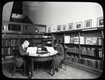 Music Library, Man and woman reading in "small room"