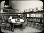 Music Library, Man and woman reading in "small room"