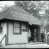 New Dorp, before 1913, former real estate office, people in doorway