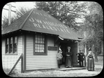 New Dorp, before 1913, former real estate office, people in doorway