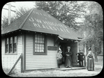 New Dorp, before 1913, former real estate office, people in doorway