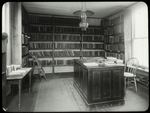 New Dorp: Interior view of New Dorp Traveling station, showing large desk, shelves, etc