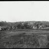 New Dorp: General view near New Dorp Branch, showing meadow, homes beyond