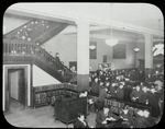 96th Street, Adult room, 1923, "showing section used for reading public" and the stairway thronged with people