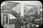 96th Street, Adult room, 1923, "showing section used for reading public" and the stairway thronged with people