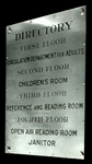 Seward Park interior views, Directory sign, "Taken by Mr. Adam's order, March 1915"
