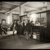 Seward Park interior views, young people at Reference desk