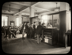 Seward Park interior views, young people at Reference desk