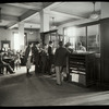 Seward Park interior views, young people at Reference desk