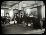 Seward Park interior views, young people at Reference desk